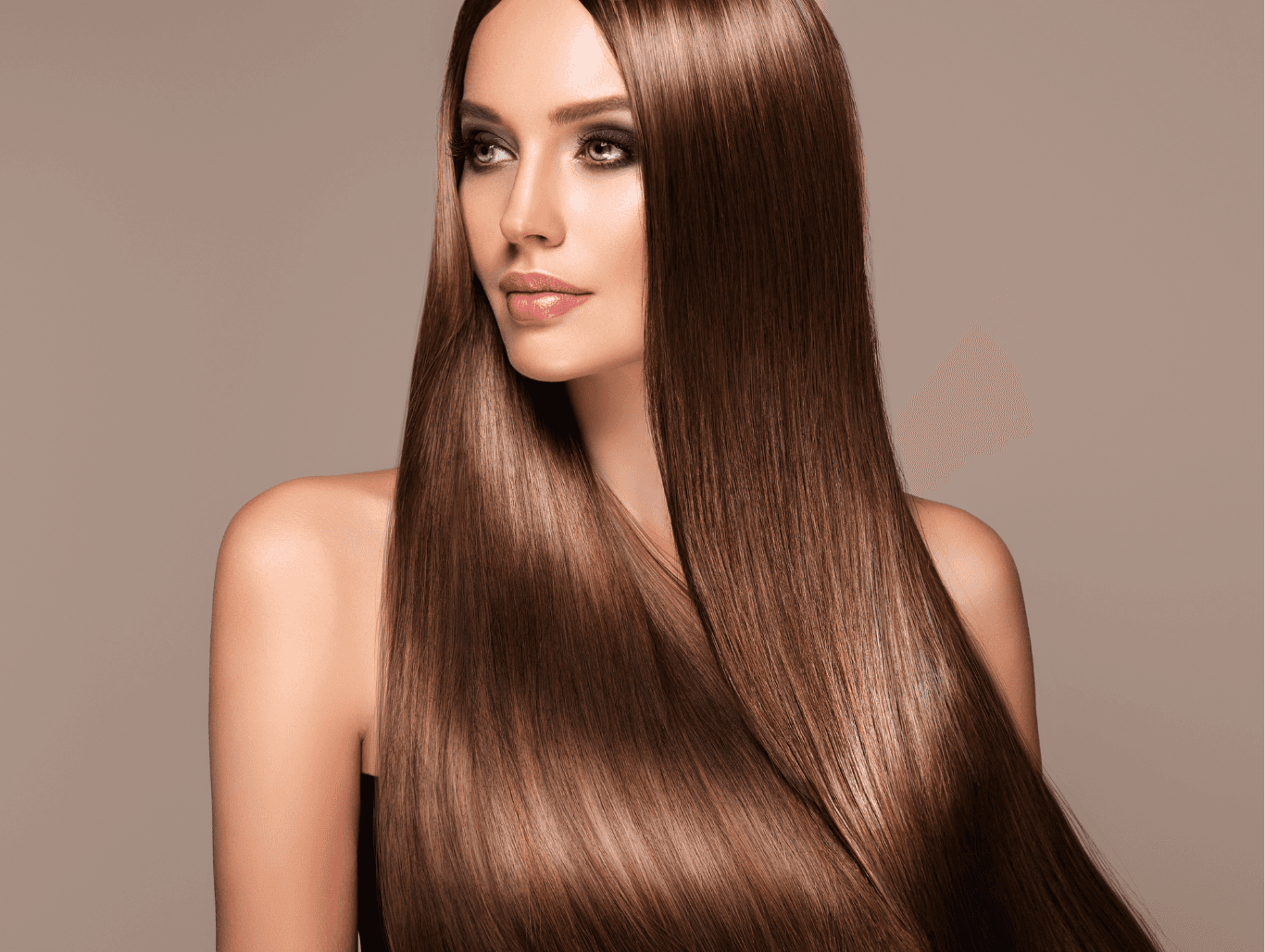 Woman with long, sleek, shiny hair after Extenso Smooth treatment at Nicolas Ablitt Hair Studio in Corringham, Essex – ideal for softening and controlling long, frizzy hair.