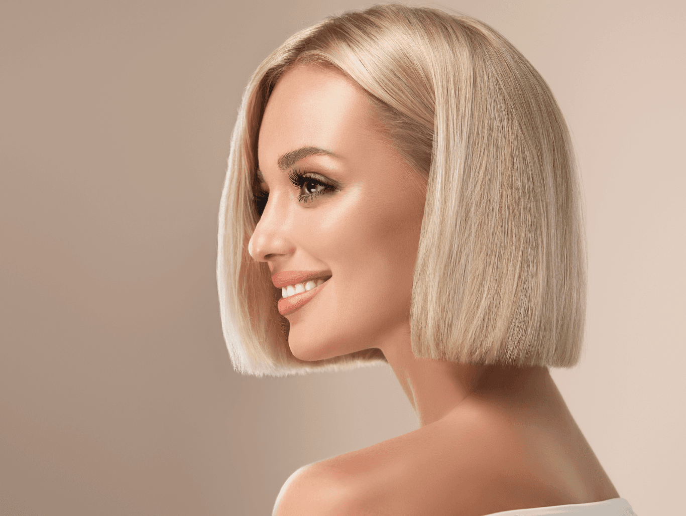 Woman with sleek, straight blonde bob after Extenso Smooth treatment at Nicolas Ablitt Hair Studio in Corringham, Essex – perfect for frizz-free shorter hair.