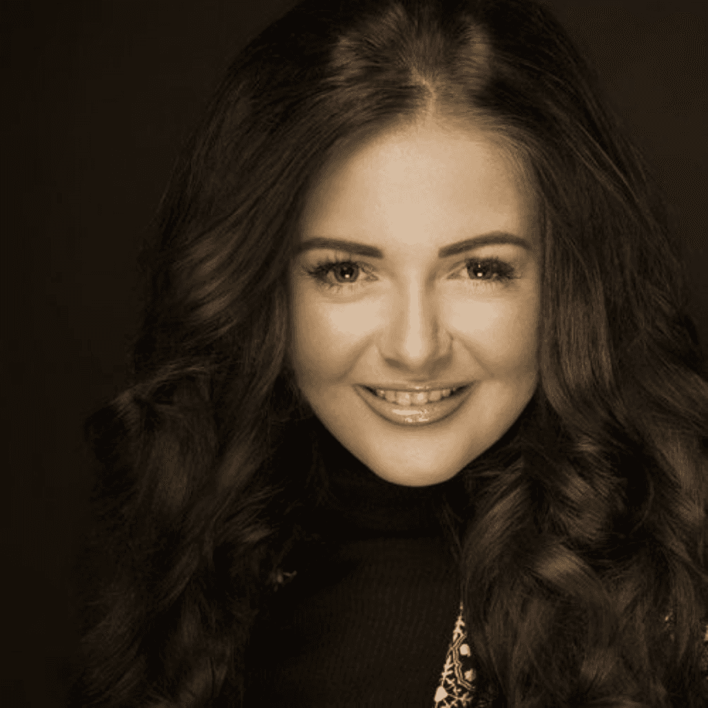 Portrait of Kiera, professional hairstylist at Nicolas Ablitt Hair Studio in Corringham, Essex. Specialising in bespoke colouring, highlights, and beautiful styling, Kiera is known for creating personalised, luxurious hair looks.